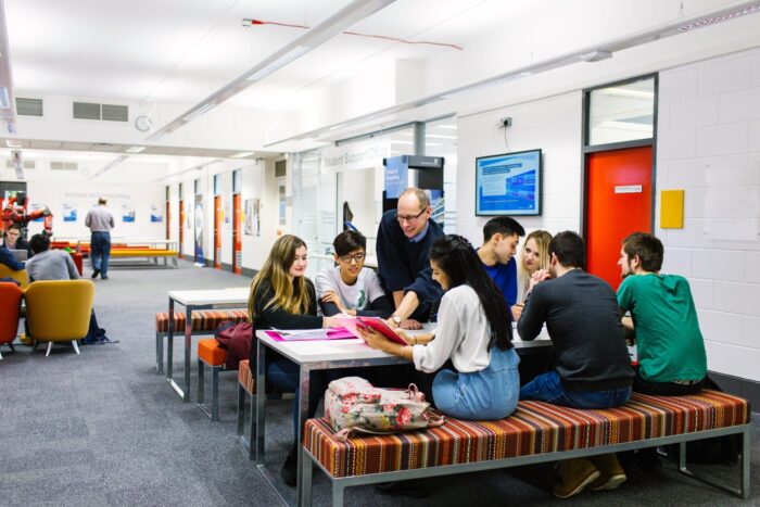 Students working round table